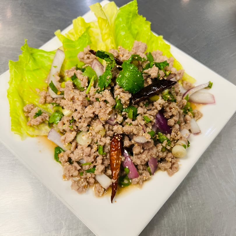 Kenzo Thai & Sushi's Larb, a Thai dish with minced meat, herbs, onions, and chili on lettuce.